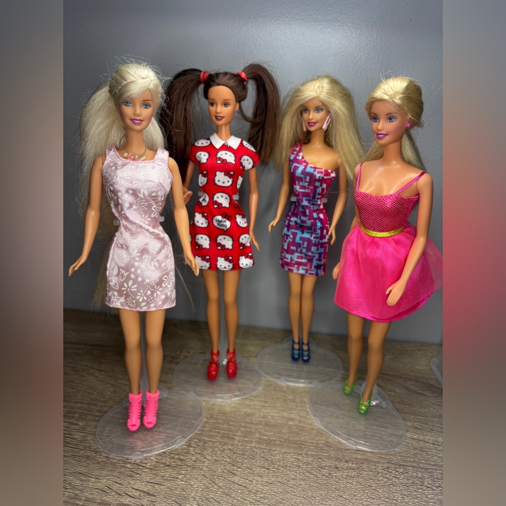 Four Y2K Barbie and Theresa Fashion Dolls